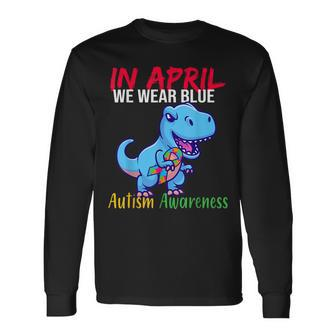 In April We Wear Blue Autism Awareness Month Trex Dinosaur Long Sleeve T-Shirt T-Shirt | Mazezy