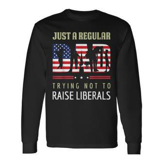 Just A Regular Dad Trying Not To Raise Liberals Fathers Day Long Sleeve T-Shirt - Seseable