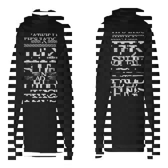 Thats What I Do I Fix Stuff And I Build Things Weathered Long Sleeve T-Shirt | Mazezy
