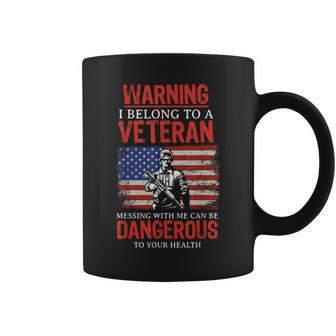 Funny Veteran Wife I Belong To A Veteran Dangerous Warning Coffee Mug | Mazezy