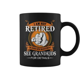 I Am Not Retired Im Under New Management See Grandkids Coffee Mug | Mazezy