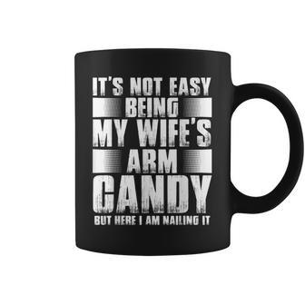 Its Not Easy Being My Wifes Arm Candy But Here Nailing It Gift For Mens Coffee Mug | Mazezy