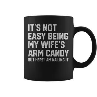Its Not Easy Being My Wifes Arm Candy Here I Am Nailing It Coffee Mug | Mazezy
