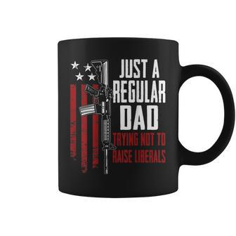 Just A Regular Dad Trying Not To Raise Liberals - On Back Coffee Mug - Seseable