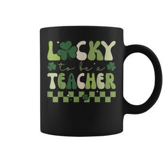 Lucky To Be A Teacher Groovy Retro St Patricks Day Coffee Mug | Mazezy