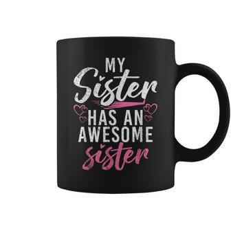 My Sister Has An Awesone Sister Funny Middle Sister Coffee Mug | Mazezy