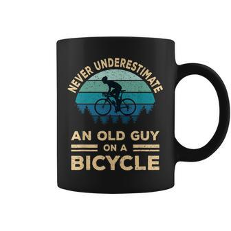 Never Underestimate An Old Guy On A Bicycle Funny Biker Dad Coffee Mug - Seseable