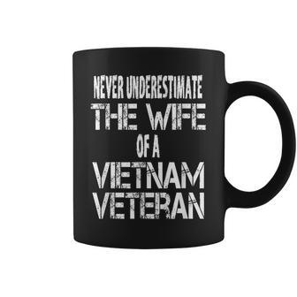 Never Underestimate The Wife Of A Vietnam Veteran Gift Coffee Mug | Mazezy