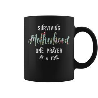 Surviving Motherhood One Prayer At A Time Coffee Mug - Seseable