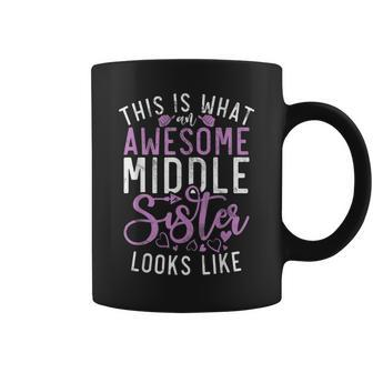 This Is What An Awesome Middle Sister Looks Middle Sister Coffee Mug | Mazezy