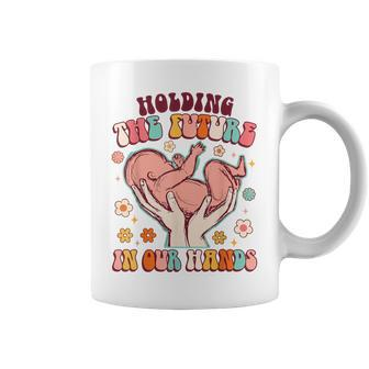 Holding The Future In Our Hands Groovy Doula Midwife L&D Coffee Mug | Mazezy