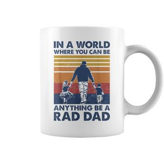In A World Where You Can Be Anything Be A Rad Dad Father Coffee Mug | Mazezy