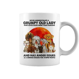 Never Underestimate A Grumpy Old Lady Who Loves Dogs Coffee Mug - Thegiftio UK
