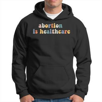 Abortion Is Healthcare Feminist Feminism Retro Pro Choice Hoodie | Mazezy