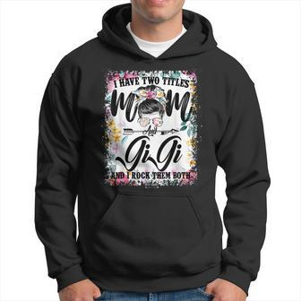 I Have Two Titles Mommy And Gigi Bleached Floral Messy Bun Hoodie - Seseable