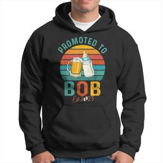 Promoted To Bob Est 2023 Baby Reveal Funny Fathers Day Hoodie - Thegiftio UK