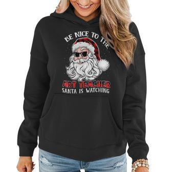 Be Nice To The Art Teacher Santa Is Watching Funny Christmas Women Hoodie Graphic Print Hooded Sweatshirt - Thegiftio UK