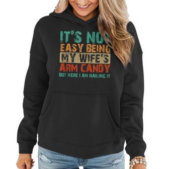 Fathers Day Arm Candy Its Not Easy Being My Wifes Mens Women Hoodie | Mazezy