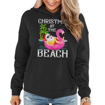 Funny Flamingo Float Santa Claus Christmas At The Beach Women Hoodie Graphic Print Hooded Sweatshirt - Thegiftio UK