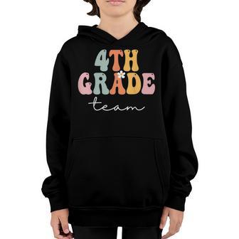 4Th Grade Team Retro Groovy Women Happy First Day Of School Youth Hoodie - Thegiftio UK