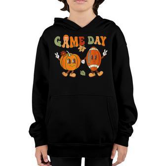 Retro Groovy Thanksgiving Game Day Pumpkin Football Youth Hoodie - Thegiftio UK
