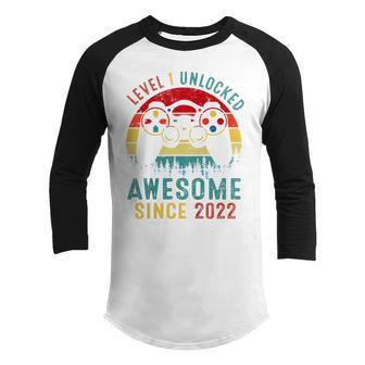 Kids Level 1 Unlocked Awesome Since 2022 1St Birthday Boys Gifts Youth Raglan Shirt - Thegiftio UK