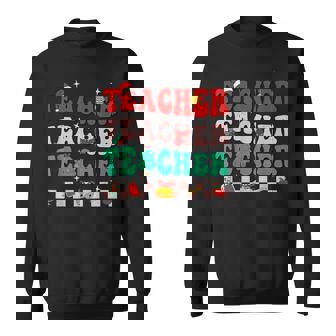 Christmas Groovy Santas Favorite Teacher Retro Xmas Holiday Men Women Sweatshirt Graphic Print Unisex - Thegiftio