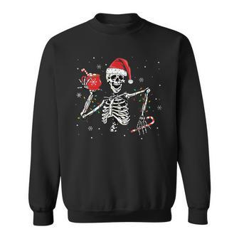 Christmas Skeleton With Smiling Skull Drinking Coffee Latte V5 Men Women Sweatshirt Graphic Print Unisex - Seseable