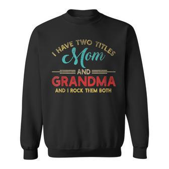 Funny I Have Two Titles Mom And Grandma And I Rock Them Both Sweatshirt - Seseable