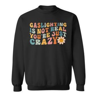 Gaslighting Is Not Real Youre Just Crazy Retro Groovy Sweatshirt | Mazezy