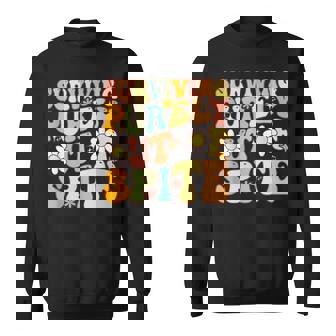 Groovy Surviving Purely Out Of Spite A Humorous Funny Joke Sweatshirt | Mazezy