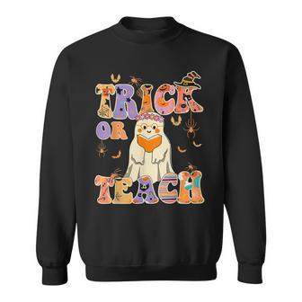 Groovy Trick Or Teach Halloween Teacher Life Retro Vintage V2 Men Women Sweatshirt Graphic Print Unisex - Thegiftio UK
