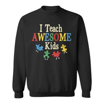 I Teach Awesome Kids Autism Special Education Teacher Sweatshirt | Mazezy