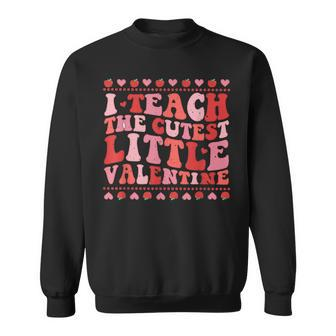 I Teach The Cutest Little Valentine Heart Valentines Day Sweatshirt - Seseable
