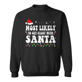 Most Likely To Get Sassy With Santa Xmas Funny Christmas Men Women Sweatshirt Graphic Print Unisex - Seseable