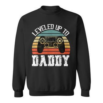 New Dad Fathers Day Leveled Up To Daddy V2 Sweatshirt - Seseable
