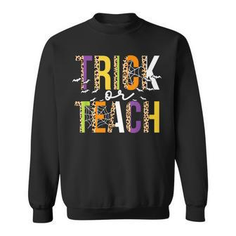 Retro Vintage Groovy Trick Or Teach Halloween Teacher V7 Men Women Sweatshirt Graphic Print Unisex - Thegiftio UK