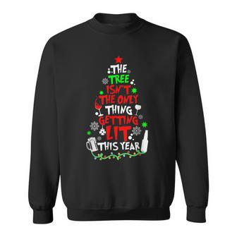 The Tree Isnt The Only Thing Getting Lit This Year Sweatshirt - Seseable