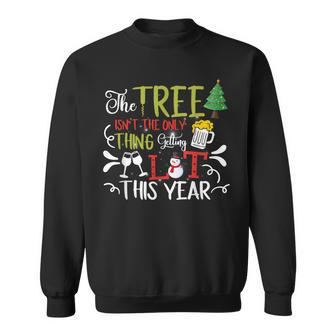 The Tree Isnt The Only Thing Getting Lit This Year Xmas Sweatshirt - Seseable