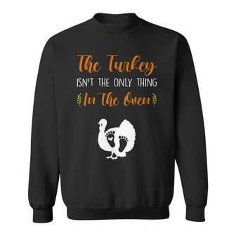 The Turkey Isnt The Only Thing In The Oven Pregnancy Reveal Sweatshirt - Seseable