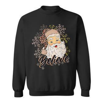 Vintage Snow And Santa Claus Merry Christmas Believe Christ Men Women Sweatshirt Graphic Print Unisex - Seseable