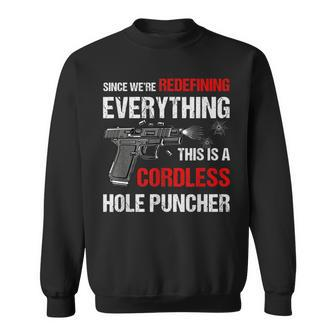 We Are Redefining Everything This Is A Cordless Hole Puncher Sweatshirt - Seseable