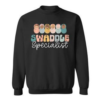 Womens Swaddle Specialist Funny Nicu Nurse Saying Groovy Mom Baby Sweatshirt | Mazezy