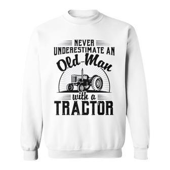 Never Underestimate An Old Man With A Tractor Farmer Dad Sweatshirt | Mazezy