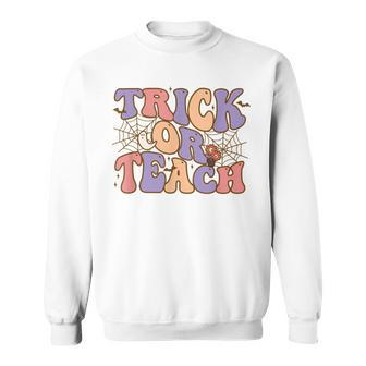 Retro Vintage Groovy Trick Or Teach Halloween Teacher V4 Men Women Sweatshirt Graphic Print Unisex - Thegiftio UK