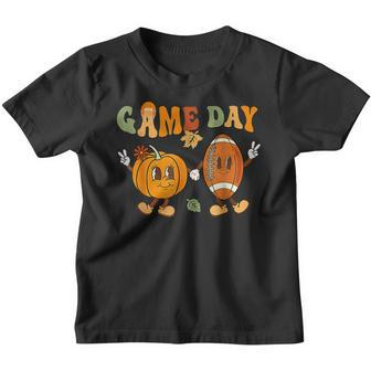 Groovy Thanksgiving Game Day Pumpkin Football Halloween Fall Youth T-shirt - Thegiftio UK