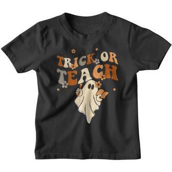 Groovy Trick Or Teach Halloween Teacher Life Retro Vintage Youth T-shirt - Thegiftio UK
