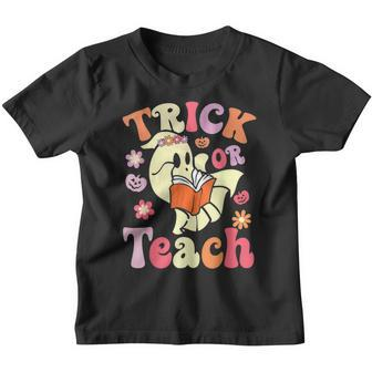Retro Vintage Groovy Trick Or Teach Halloween Teacher Life V36 Youth T-shirt - Thegiftio UK