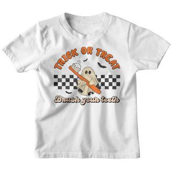 Funny Halloween Dentist Trick Or Treat Brush Your Th Youth T-shirt - Thegiftio UK
