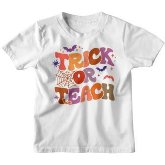 Retro Vintage Groovy Trick Or Teach Halloween Teacher Life V33 Youth T-shirt - Thegiftio UK